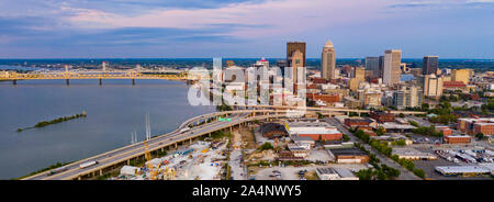 Colorful bridges lead into the buildings and streets of downtown city center Louisville Kentucky Stock Photo