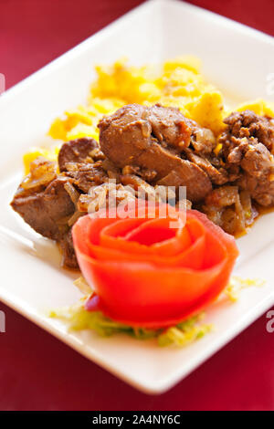 breakfast in the morning scrambled eggs with beef and tomatoes Stock Photo