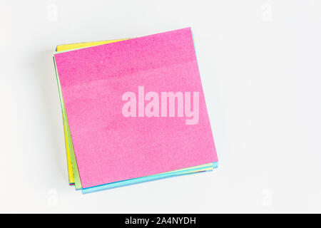 Colorful office stickers isolated on white background. Stack of memo notepaper Stock Photo