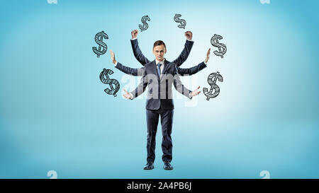 A businessman with six hands surrounded by dollar sign pictures on blue background. Stock Photo