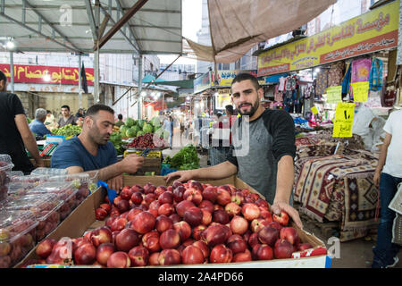 Ramallah, Palestine - June  2019: Fruit stalls and sellers at The central Souq or market, also called the Hesbeh in Ramallah, Palestine Stock Photo