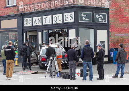 Location movie set with a simulated police car crash in Steveston British Columbia Canada Stock Photo