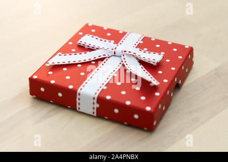 Red polka dots gift box Stock Photo