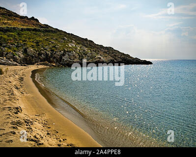 Beautiful sandy beach and overcast sky. Marmari in  Laconia, Greece. Stock Photo