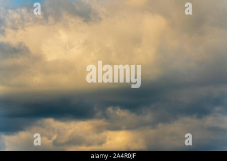 Summer clouds floating across sunny sky to change weather. Natural meteorology abstract texture, nature background Stock Photo