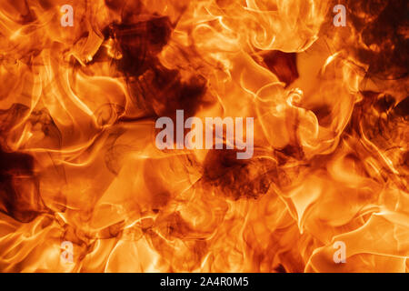 Abstract red fire natural texture with flames. Beautiful dangerous firestorm abstract background. Stock Photo