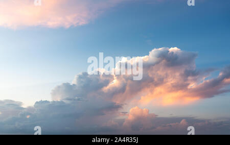Blue sunset sky with many nice white clouds Stock Photo