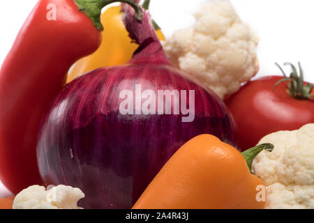 Vegetable Mix for salad on white background.  tomatoe, cauliflower, carrots, onion and peppers. Health Concept. Copy Space Stock Photo