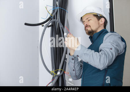 plumber dealing with internal pipes Stock Photo