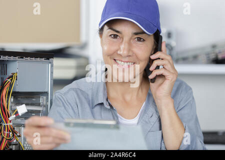 female researcher technician on the phone Stock Photo