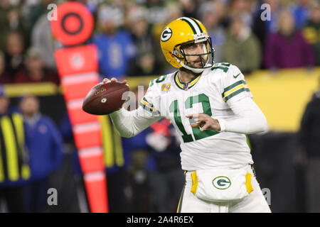 Oct 6, 2019: Dallas Cowboys defensive end Dorance Armstrong #92 reaches for Green  Bay Packers quarterback Aaron Rodgers #12 for a sack during an NFL game  between the Green Bay Packers and