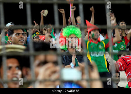 Bangladeshi cricket fans cheer for their team, at the England versus Bangladesh match of the ICC Cricket World Cup 2011, in Zahur Ahmed Chowdhury Stadium, Chittagong, Bangladesh. March 11, 2011. Stock Photo