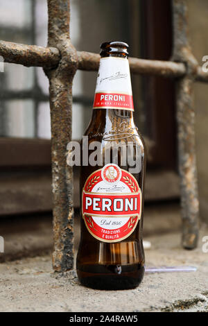 Empty bottle of Italian Peroni beer in Trastevere district of Rome, Italy Stock Photo