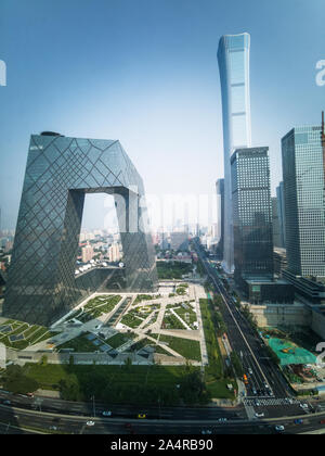 View of China Central Television (CCTV) building in CBD of Beijing, the higher tower in right side is CITIC tower, with a total height of 528 meters Stock Photo