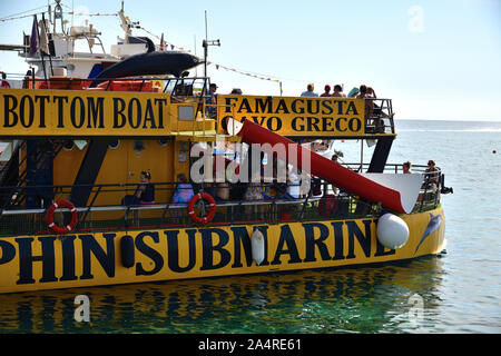 Protaras, Cyprus - Oct 10. 2019. Submarine dolphin -Sightseeing ship with tourists sets sail Stock Photo