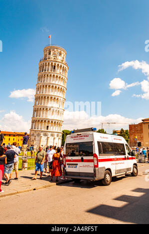 Pisa, Italy - September 03, 2019: The famous leaning Tower of Pisa or La Torre di Pisa at the Cathedral Square, Piazza del Duomo full of tourists and Stock Photo