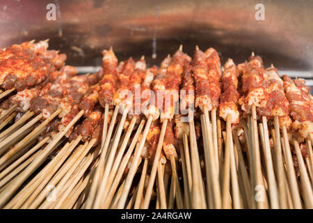 Spicy mala seasoned meat on stick for grill Stock Photo