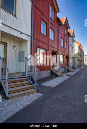 Row of newly built typical Swedish homes in the suburb of Runby, Upplands Vasby, Stockholm County, Sweden Stock Photo