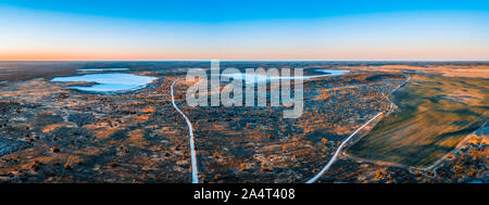 Salt lakes Kenyon and Crosbie in the desert at sunset - aerial panorama Stock Photo