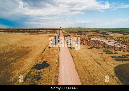 Unsealed road in Australian outback - aerial landscape Stock Photo