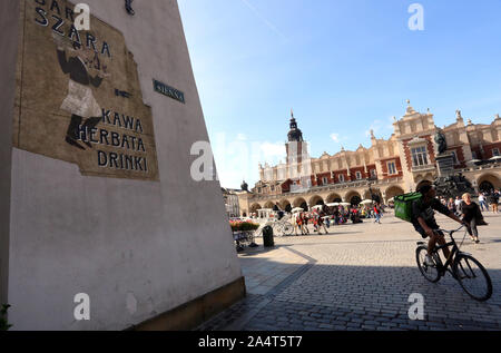 Cracow. Krakow. Poland. Exterior old vintage wall painted sign of 'Szara BAR' in the Main Market Place, the center of the Old Town. Stock Photo