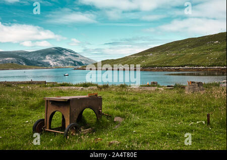 Remains of Bunavoneader Whaling Station on the shores of Loch A Siar (West Loch Tarbert), Isle of Harris, Outer Hebrides, Scotland Stock Photo