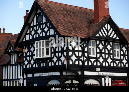 tudor rose tea rooms mock tudor building former post office and general store in Port Sunlight England UK Stock Photo