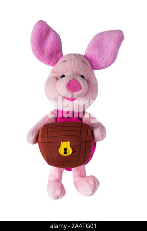 Piglet holding treasure chest soft cuddly toy from Winnie the Pooh isolated on white background Stock Photo