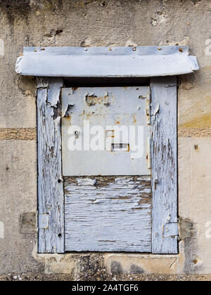 Old wooden post-box at Le Petit Pressigny post office, France. Stock Photo