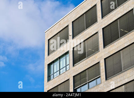 Office building with closed blinds in detail Stock Photo