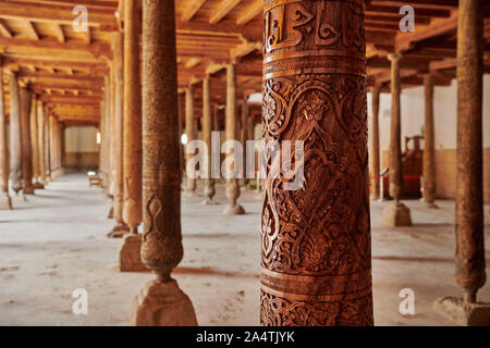 old carved wooden columns in Djuma Mosque old town Khiva, Itchan-Kala, Khiva, Uzbekistan, Central Asia Stock Photo