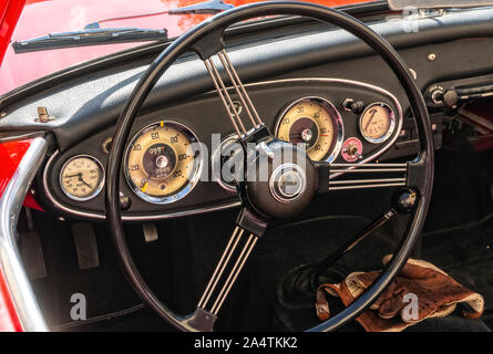 A BRITISH CAR DASHBOARD REV COUNTER DIAL WITH VARIOUS RED WARNING ...