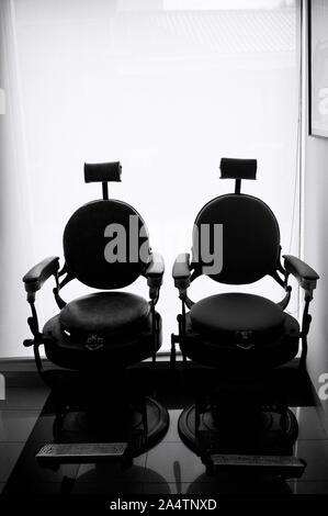 A couple of vintage barber chairs (Madeira, Portugal) Stock Photo
