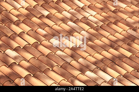 Roof renovated in round tiles of Mediterranean type. Stock Photo