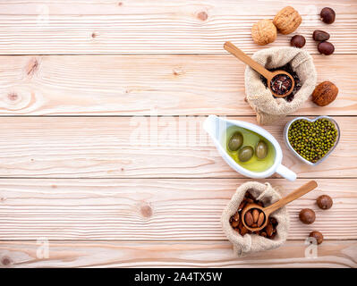 Ingredients for the healthy foods selection .Various different kinds of nuts set up on wooden table. Stock Photo