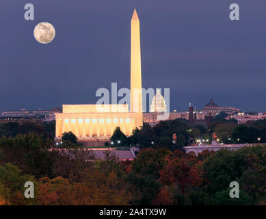 Washington DC skyline at dusk with autumn colorful trees on the foreground Stock Photo