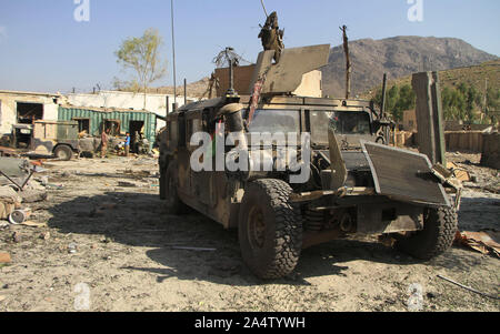 Mehtarlam. 16th Oct, 2019. Photo taken on Oct. 16, 2019 shows a damaged military vehicle at the site of a car bomb in Alishing district of Laghman province, Afghanistan. Two police officers and a civilian were killed and 43 people wounded after a car bomb blast rocked Alishing district in Afghanistan's eastern Laghman province on Wednesday, the district chief said. Credit: Saifurahman Safi/Xinhua/Alamy Live News Stock Photo