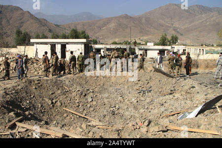 Mehtarlam. 16th Oct, 2019. Photo taken on Oct. 16, 2019 shows the site of a car bomb in Alishing district in Laghman province, Afghanistan. Two police officers and a civilian were killed and 43 people wounded after a car bomb blast rocked Alishing district in Afghanistan's eastern Laghman province on Wednesday, the district chief said. Credit: Saifurahman Safi/Xinhua/Alamy Live News Stock Photo