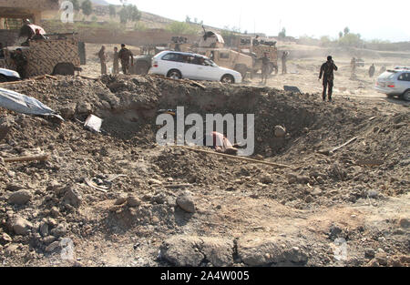 Mehtarlam. 16th Oct, 2019. Photo taken on Oct. 16, 2019 shows the site of a car bomb in Alishing district in Laghman province, Afghanistan. Two police officers and a civilian were killed and 43 people wounded after a car bomb blast rocked Alishing district in Afghanistan's eastern Laghman province on Wednesday, the district chief said. Credit: Saifurahman Safi/Xinhua/Alamy Live News Stock Photo