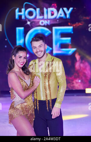 Hamburg, Germany. 16th Oct, 2019. Guest star Sarah Lombardi, pop singer, and Panagiotis 'Joti' Polizoakis, figure skater, stand for a photo call to the Holiday on Ice Show 'Supernova' in the Volksbank Arena on the ice rink. Credit: Georg Wendt/dpa/Alamy Live News Stock Photo