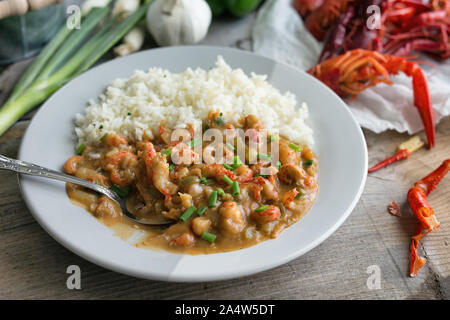 Crawfish étouffée on a bed of rice. Stock Photo