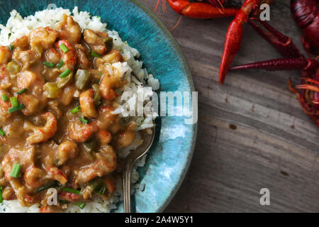 Crawfish étouffée on a bed of rice. Stock Photo