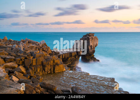 Dusk at Pulpit Rock at Portland Bill on the Dorset Jurassic Coast.  Picture Credit: Graham Hunt/Alamy Stock Photo