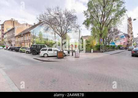 Budapest, Hungary - September 28, 2019: Kids playground famous for surrounding street wall art painting on Kiraly Street or Király utca in Budapest. Stock Photo