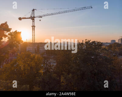 construction building site crane on sunset Stock Photo