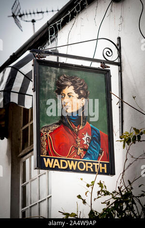 The George Inn, Wadworth Pub sign, St Briavels, Gloucestershire, UK Stock Photo