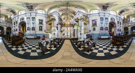 360 degree panoramic view of LVIV, UKRAINE - AUGUST 2019: Full spherical seamless hdri panorama 360 degrees inside interior of old gothic uniate church of Anthony of Padua in equi