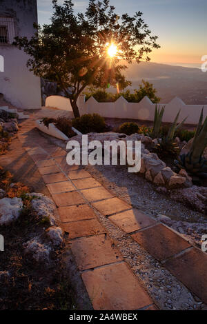 A fork in a path at sunrise in Comares, Axarquia, Malaga, Andalucia, Costa del Sol, Spain Stock Photo