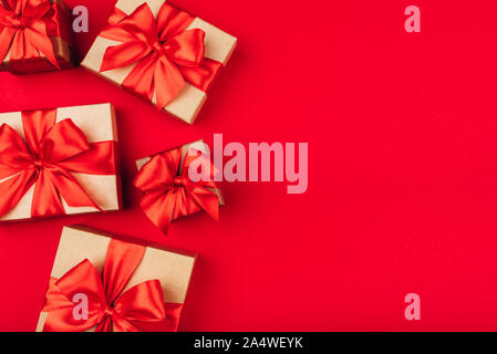 Frame of cardboard gift boxes with bows. Stock Photo