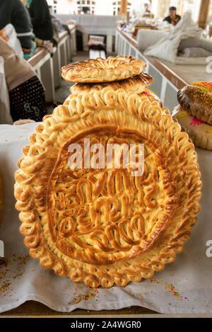 Uzbek bread at the Siyob Bazaar. Samarkand, a UNESCO World Heritage Site. Uzbekistan Stock Photo